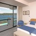 Fotos Zimmer: Doppelbettzimmer mit Blick auf den See, Zweibettzimmer mit Nuztung als Einzelzimmer mit Blick auf den See