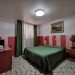 Photos Chambres: Double avec un grand lit double et salle de bain en commun